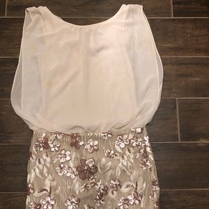 Adrian champagne dress.